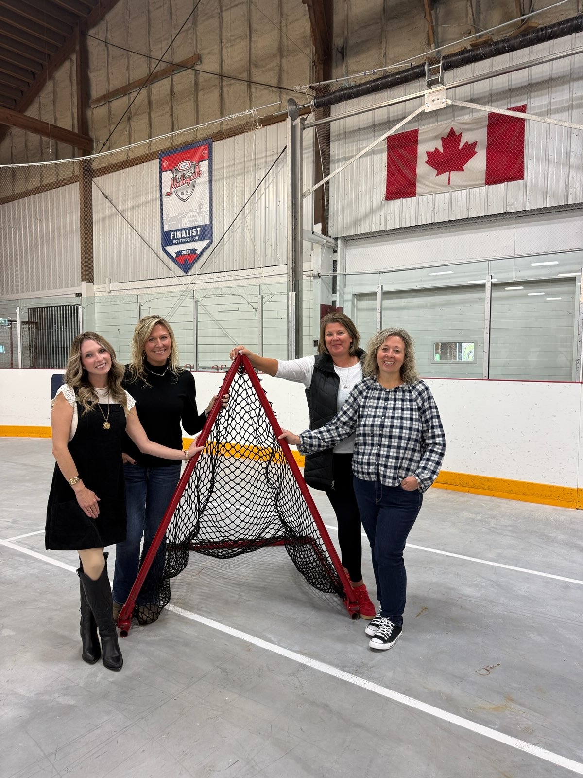 North of 89 Alliance volunteers with new lacrosse nets at the Honeywood Arena